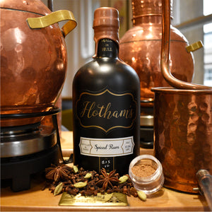 New Hotham's Spiced Rum. Rose gold wax dip, black bottle