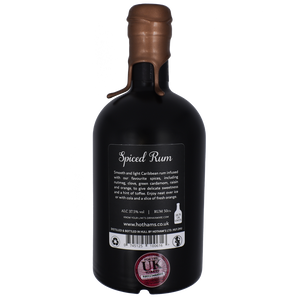 New Hotham's Spiced Rum. Rose gold wax dip, black bottle, Back label